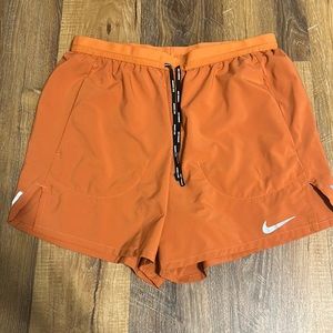 Orange Dri fit Nike shorts